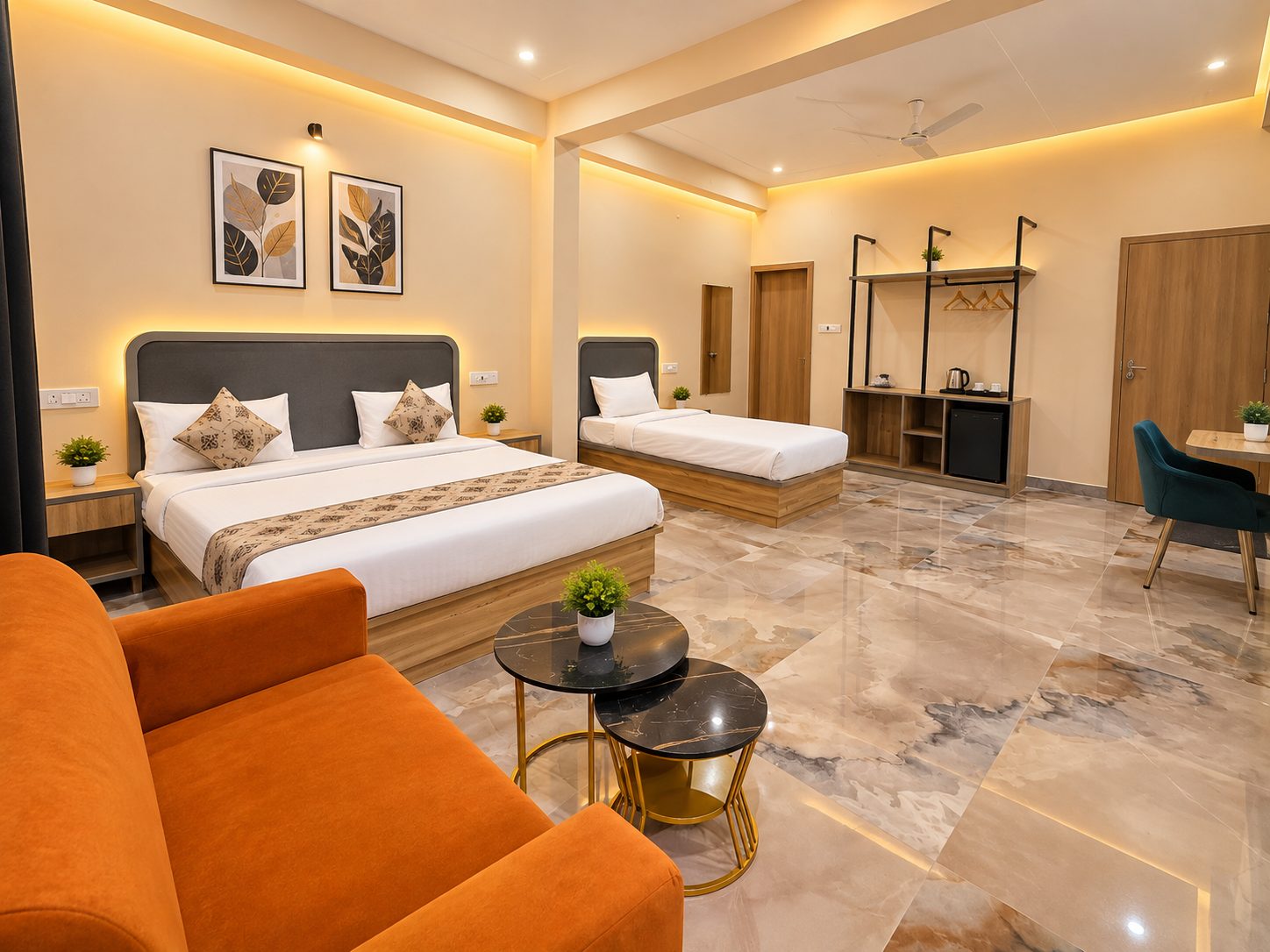 Classic Room at City Comfort Hotel — beds under warm cove lighting, a rust sofa and marble floor